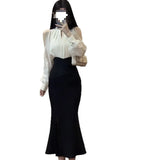 And Autumn 2025 New Hanging Neck Open Shoulder Design Long-Sleeved Top Temperament High-Waisted Fishtail Dress Fashion Suit