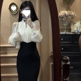 And Autumn 2025 New Hanging Neck Open Shoulder Design Long-Sleeved Top Temperament High-Waisted Fishtail Dress Fashion Suit