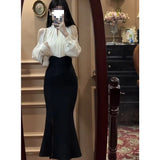 And Autumn 2025 New Hanging Neck Open Shoulder Design Long-Sleeved Top Temperament High-Waisted Fishtail Dress Fashion Suit