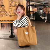 New Retro Women's Shoulder Bag Simple Solid Color Small Fresh Canvas Bag Literary Women's Buckle Tote Bag Large Capacity
